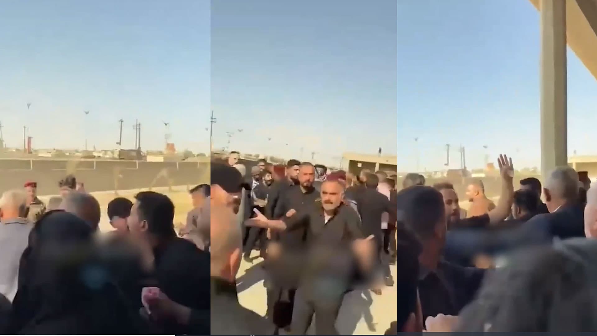 پاسەوانانی بەرپرسێک بە چەک مامەڵە لەگەڵ کەسوکاری قوربانییەکانی کوت دەکات