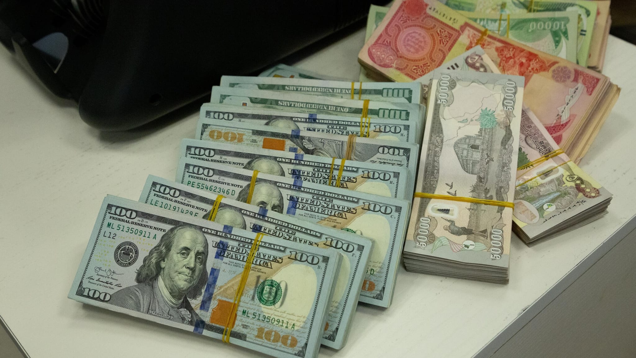 نرخی دینار بەرامبەر بە دۆلار بە ناجێگیری ماوەتەوە