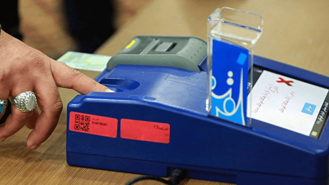 ئەندامانی حەشدی شەعبی کارتی دەنگدان بەزۆر لەخەڵک وەردەگرن