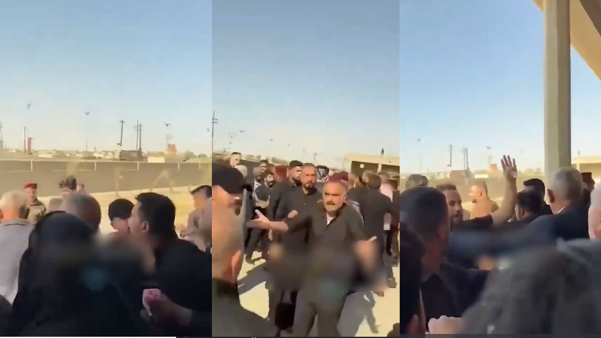 پاسەوانانی بەرپرسێک بە چەک مامەڵە لەگەڵ کەسوکاری قوربانییەکانی کوت دەکات